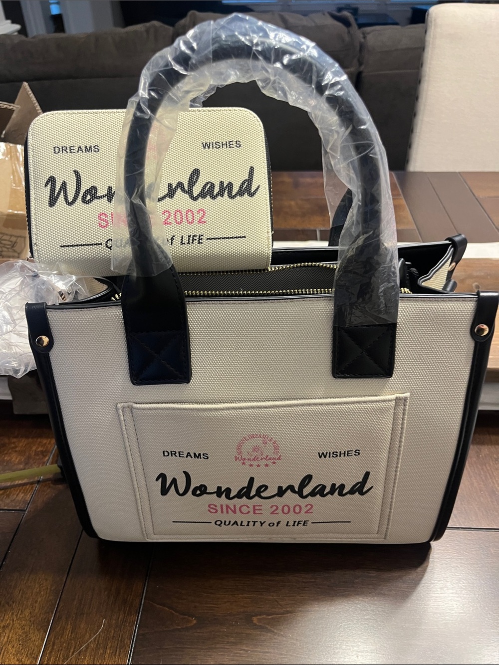 Wonderland Cream Canvas Tote with Black Trim and Logo with wallet